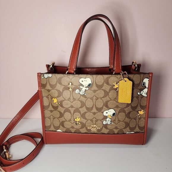 Coach Handbags - NWT CE862 COACH X PEANUTS DEMPSEY CARRYALL SIGNATURE SNOOPY WOODSTOCK BAG